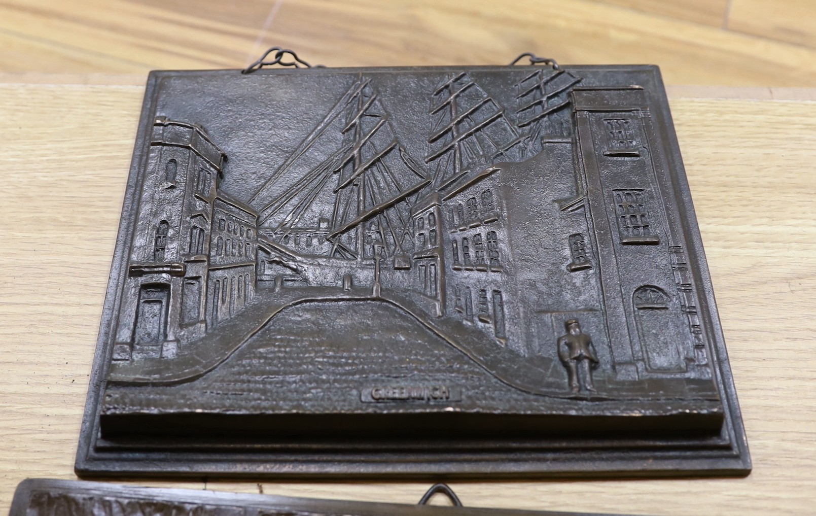 A First World War commemorative bronze plaque together with mixed collection metal and other decorative plaques etc, Commemorative plaque 39 cms high x 32 wide